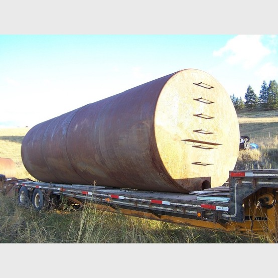 Used 9500 Gallon Steel Water Tank. Access Ladder on End. 10 in. Grooved
