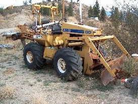 Seaman Model 60 Cable Trencher with Front Blade