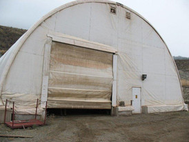 50 ft. X 70 ft. Coverall Building. c/w 2 Personnel Doors, 2 Roll Up Shop Doors, & Lights.