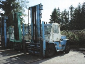 Used Cat V180 Forklift. 18,000 lb Capacity. 18 ft. Mast Height. Automatic, Gas, Fork Positioner, & Enclosed Cab.