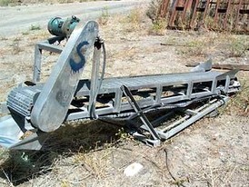 Used Food Product Conveyor. 12 in. wide x 9.5 ft long. Stainless Steel Construction with Perforated Poly Hinged Belt, 1/2 HP Chain Drive