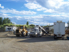 Elruss portable crushing plant. 3800 Hydrocone, 6 x 20 - 3 deck screen, 36 inch stacking conveyor and power van with 365 KW gen-set.
